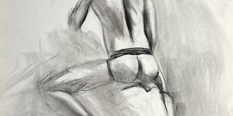 charcoal drawing of male model sitting in jocks from backside